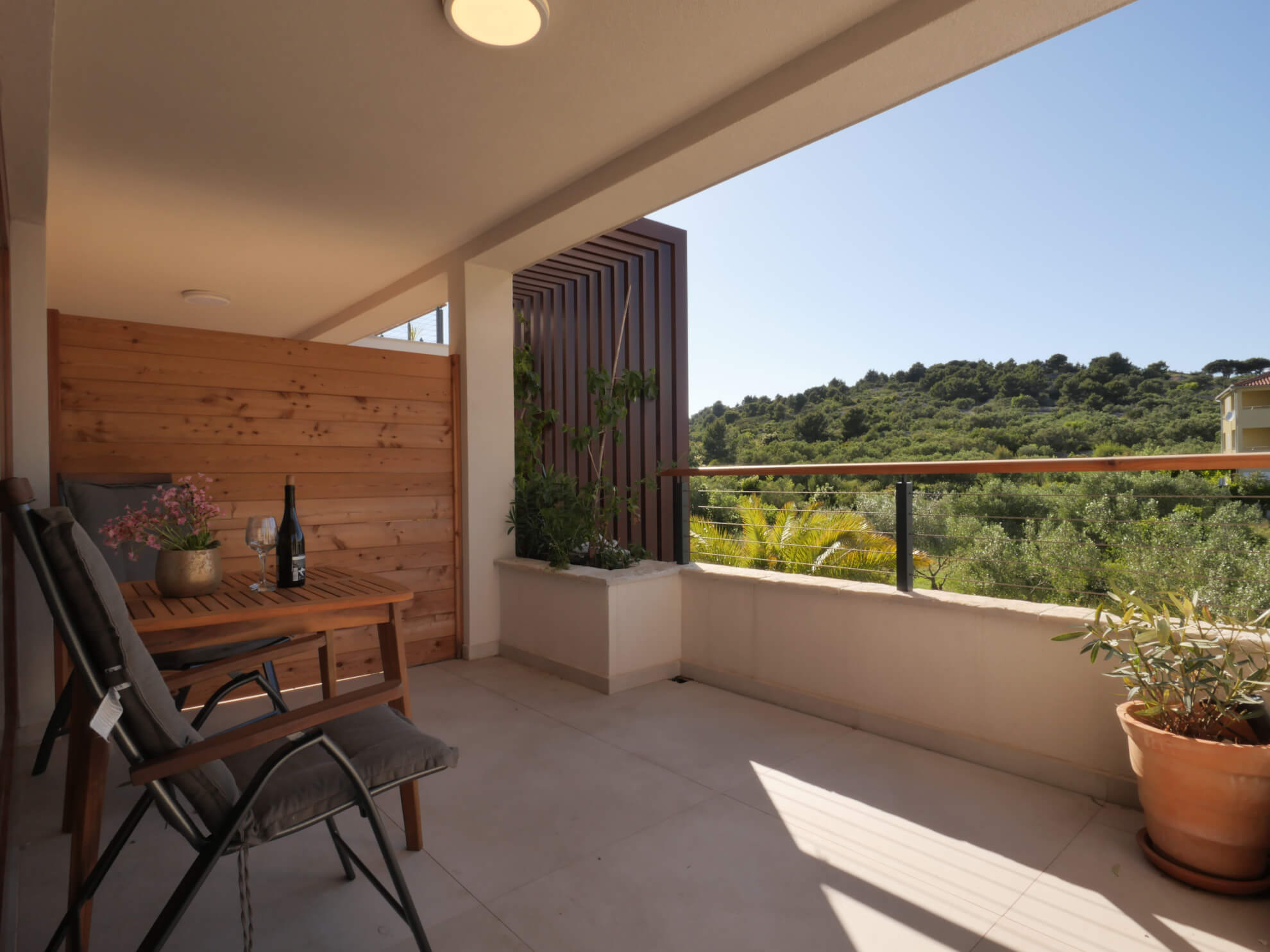 View of the lush forest from terrace lounge